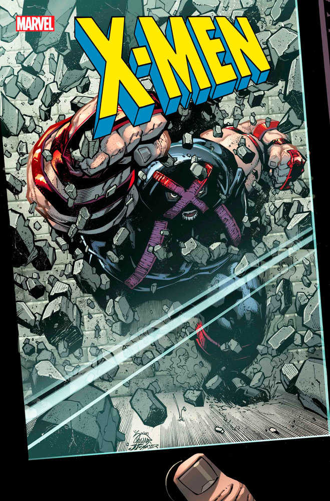 Comic book cover featuring Juggernaut breaking through a wall, with "X-MEN" in bold yellow letters.