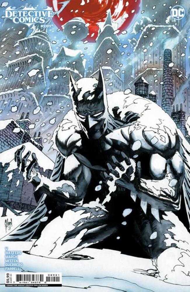 Comic book cover featuring Batman in a snowy Gotham City.