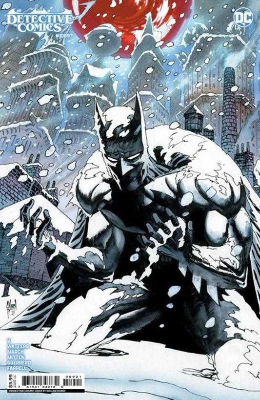 Comic book cover featuring Batman in a snowy Gotham City.