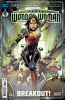 Comic book cover featuring Wonder Woman in armor leading a group of heroes during a breakout.