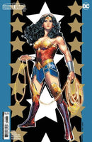 Wonder Woman comic book cover with blue, black, and star background.
