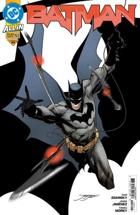 Comic book cover featuring Batman in a gray suit, throwing batarangs.
