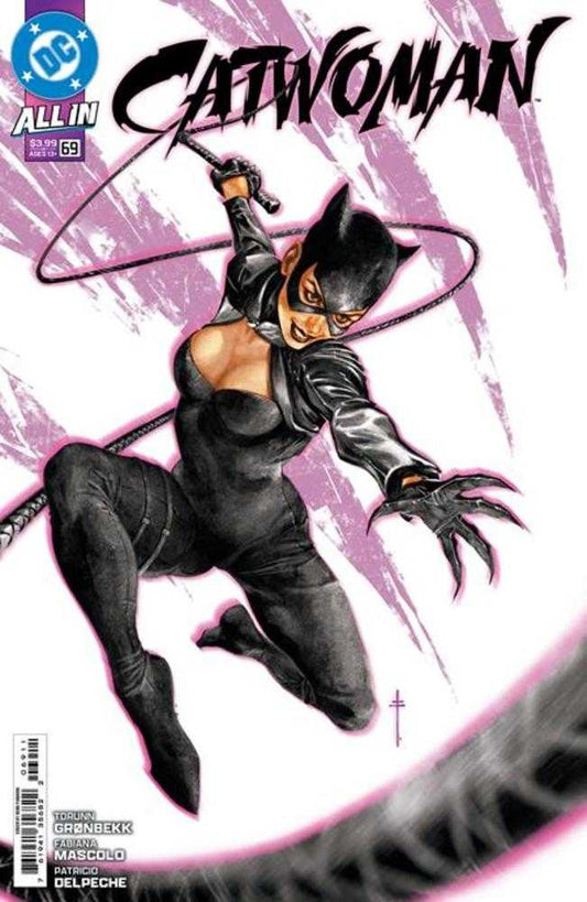 Comic book cover featuring Catwoman in a black catsuit with cat-ear mask and claws, wielding a whip, against a pink background.