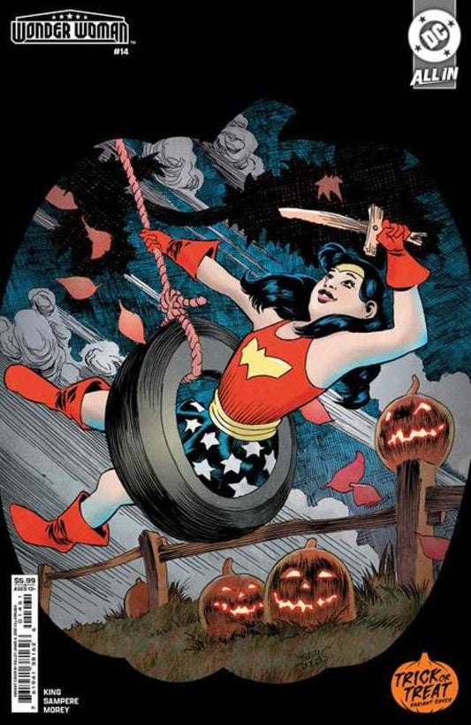 Comic book cover: Wonder Woman on a tire swing, pumpkins, Halloween theme.