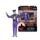 The Joker action figure in purple suit with dogs and box.