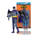 Batman '66 action figure with clear helmet accessory. Purple and gray costume with yellow belt and Batman logo. Orange background.
