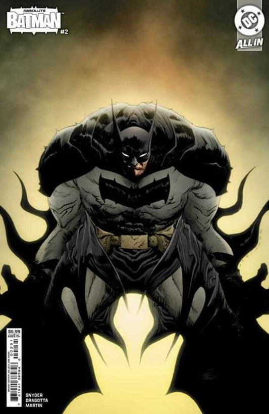 Comic book cover featuring a muscular Batman in a gray and black suit against a yellow background.