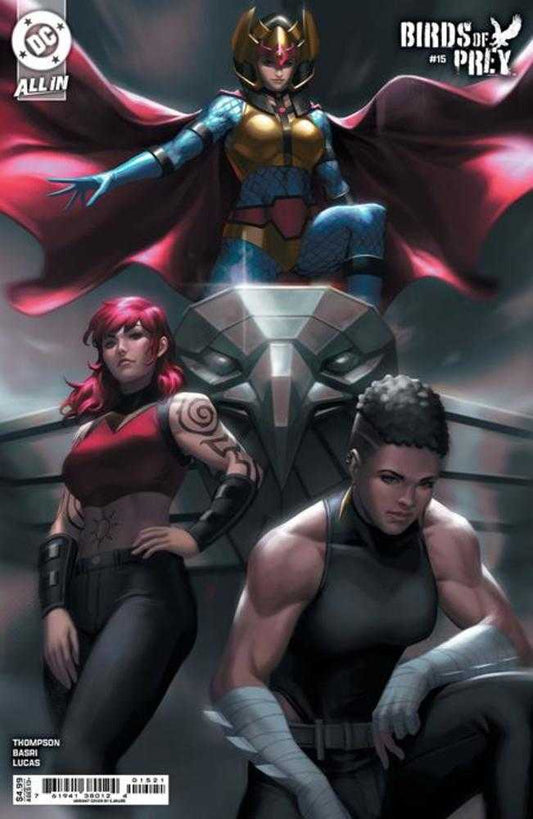 Comic book cover, Birds of Prey #15: Three women standing in front of a robotic bird statue. The woman in the back wears a gold and blue costume with a red cape. The woman on the left has red hair and tattoos on her arm, and wears a red top and black pants. The woman on the right has short black hair and wears a black tank top and pants.