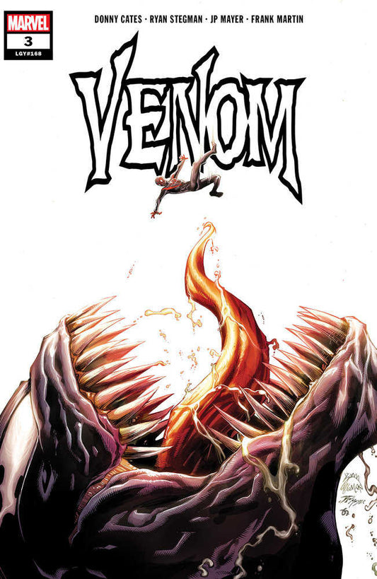 Comic book cover: Venom title, stylized monster mouth, Spider-Man figure.