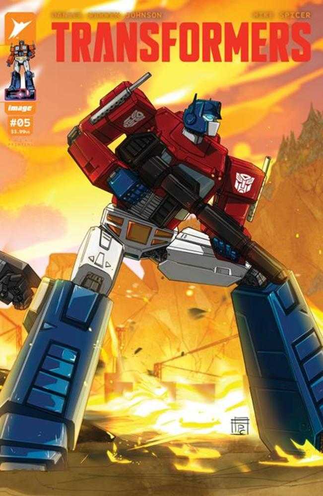 Comic book cover featuring Optimus Prime. Red, blue, and white robot standing powerfully. Orange background with "Transformers" in red letters.
