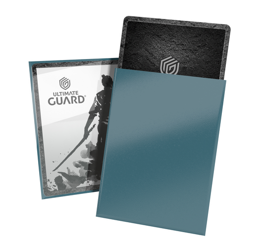 Blue card sleeves with black textured card and Ultimate Guard branding.
