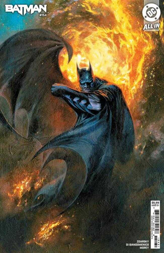Comic book cover showing Batman in a blue costume and cape with a bright orange fiery background.