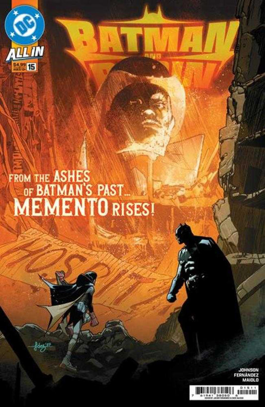 Comic book cover featuring Batman, Robin, and a large head in the background.