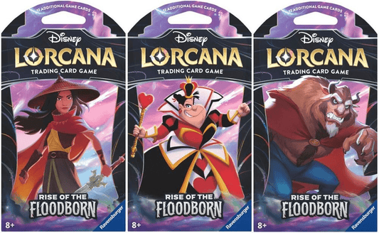Here are three Disney Lorcana "Rise of the Floodborn" trading card game booster packs. From left to right, the first one features Raya wearing a large-brimmed hat and holding a sword. The second features the Queen of Hearts holding a heart scepter. The third features Beast wearing a red cape.