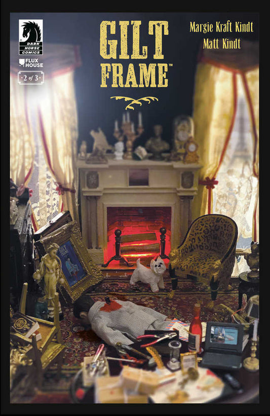 Comic book cover, "Gilt Frame," depicting a miniature room with a dead figure on the floor, a dog, and various objects.