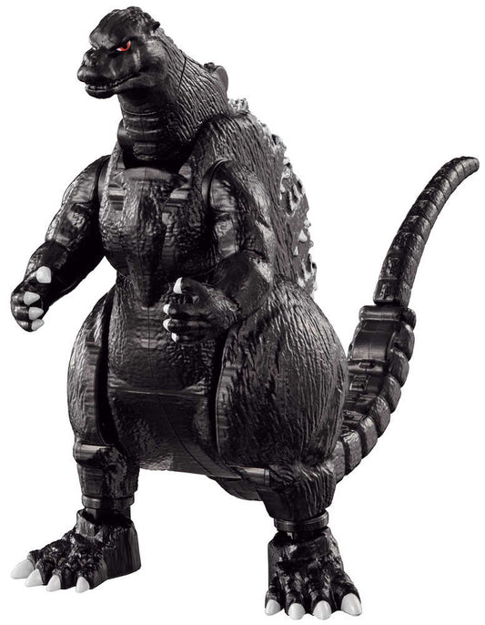 Black Godzilla toy with white claws.

