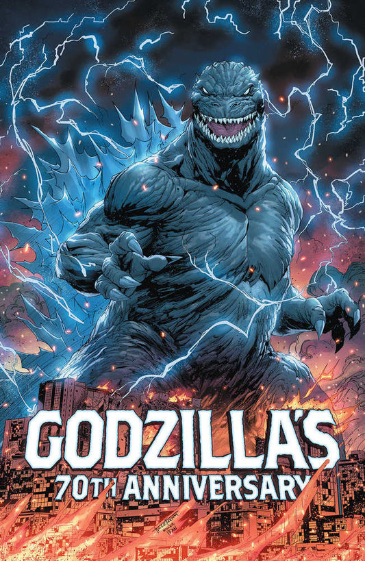 Comic book cover for Godzilla's 70th Anniversary featuring Godzilla standing over a burning city with lightning bolts around him.