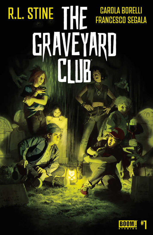 Comic book cover featuring a group of kids in a graveyard, illuminated by a lantern, under the title "The Graveyard Club."