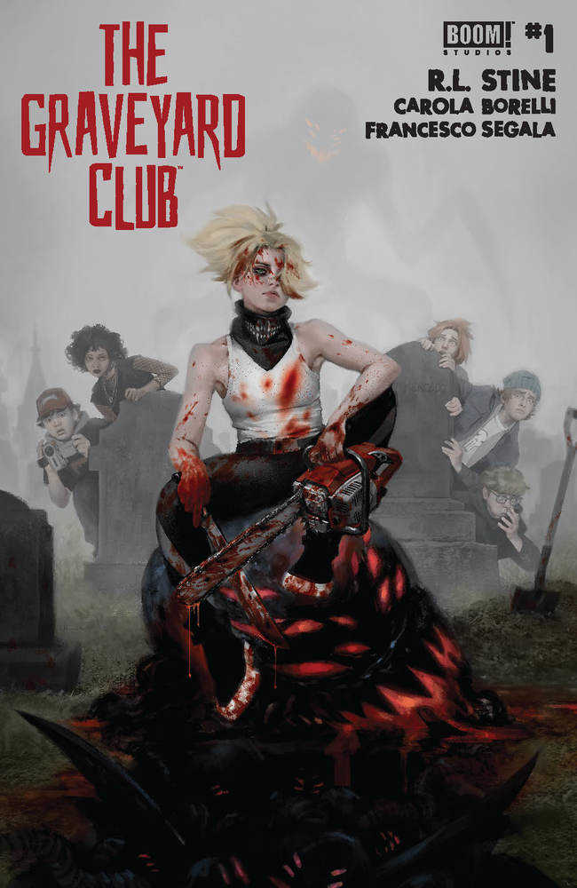 Comic book cover featuring a woman with bloody blonde hair and a black bandana with skeletal teeth, holding a bloody chainsaw while sitting on a monster, surrounded by a group of people in a graveyard.