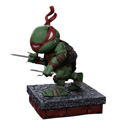 A cartoon Teenage Mutant Ninja Turtle statue of Raphael.