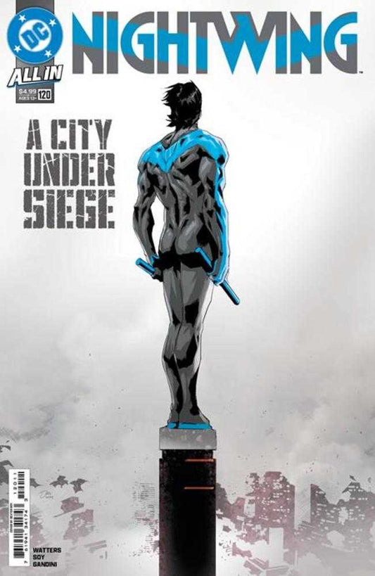 Comic book cover featuring Nightwing standing atop a pillar.