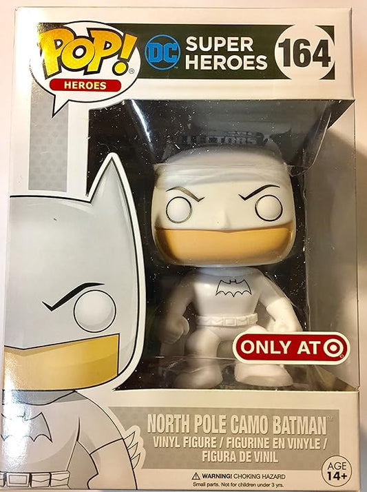 "North Pole Camo Batman" Funko Pop collectible figure, packaged in a white and gray box with a clear plastic window. The figure itself is white with tan accents. It is a Target exclusive item.