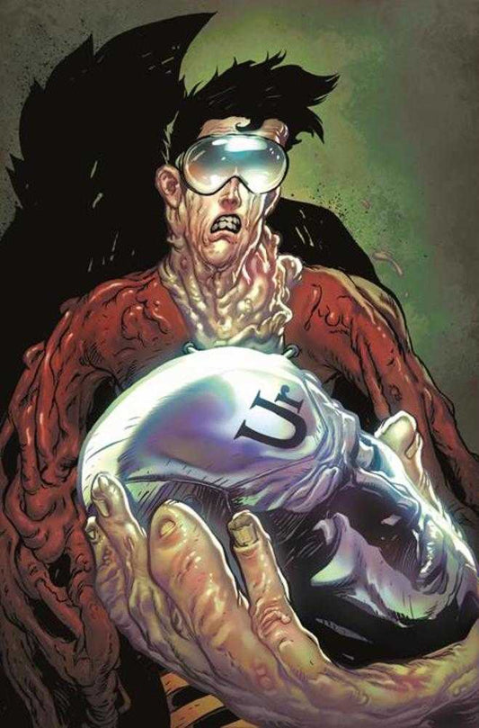 Comic book style illustration of disfigured man in goggles holding a shiny helmet with a black "U" on it.
