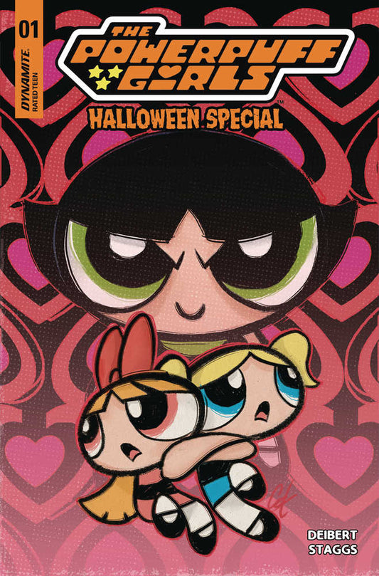 Comic book cover featuring the Powerpuff Girls Halloween Special, with Buttercup looming large in the background and Blossom and Bubbles huddled together in the foreground against a pink and black heart patterned backdrop.
