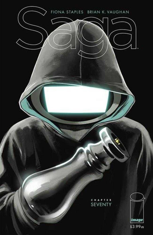 Comic book cover featuring a hooded figure with a screen for a face, holding a bottle. The title "Saga" is at the top of the image.