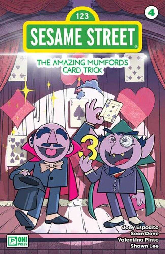 Comic book cover featuring Mumford and The Count from Sesame Street dressed as magicians, with card symbols and the Sesame Street logo.