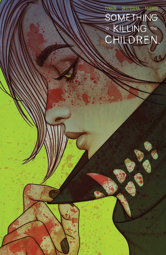 Close-up comic book cover art with blood splatters. Pale-skinned woman with white hair and green eyes in profile. Black leather jacket with bone-like graphic detail. Graphic title: "Something is Killing the Children." 
