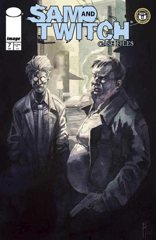 Comic book cover depicting two men in dark clothing. One man smokes a cigarette and holds a gun. City street background.