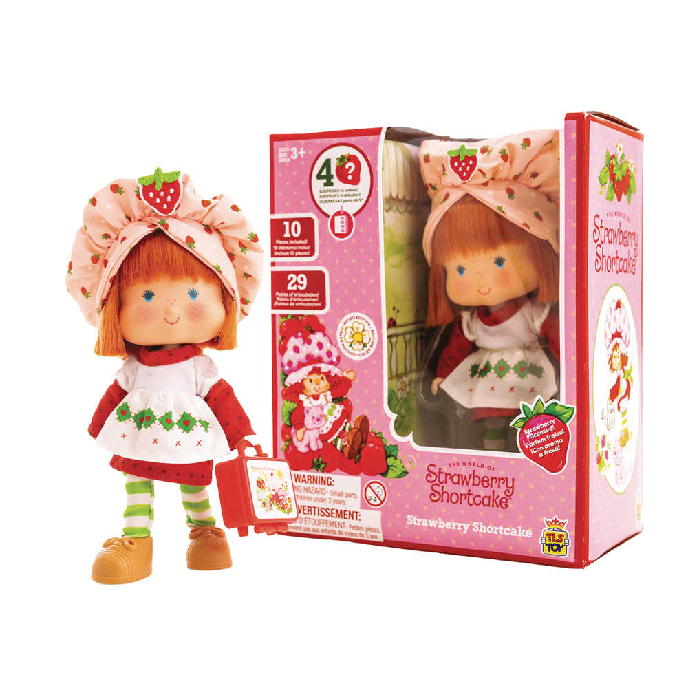 Strawberry Shortcake doll with a red suitcase and a box.