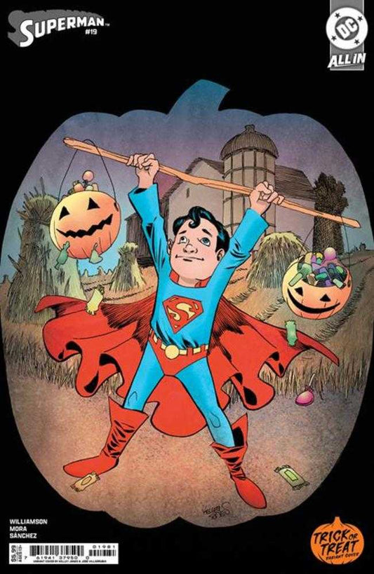 Comic book cover. Young Superman in costume holds a stick with pumpkin buckets. Rural backdrop. "Trick or Treat" variant cover.