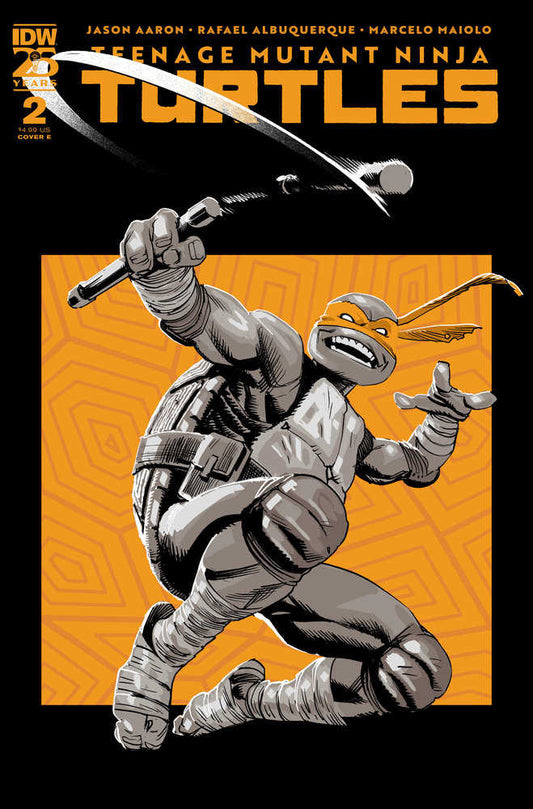 Comic book cover featuring a Ninja Turtle, with his orange mask, holding his weapon in the air.