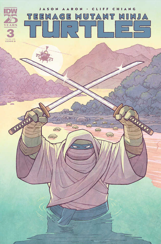 Comic book cover featuring a Teenage Mutant Ninja Turtle with crossed swords in front of a mountain landscape.