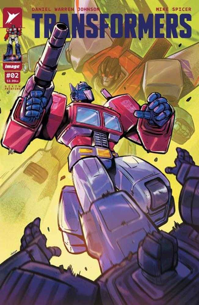 Transformers comic book cover featuring Optimus Prime firing a weapon.