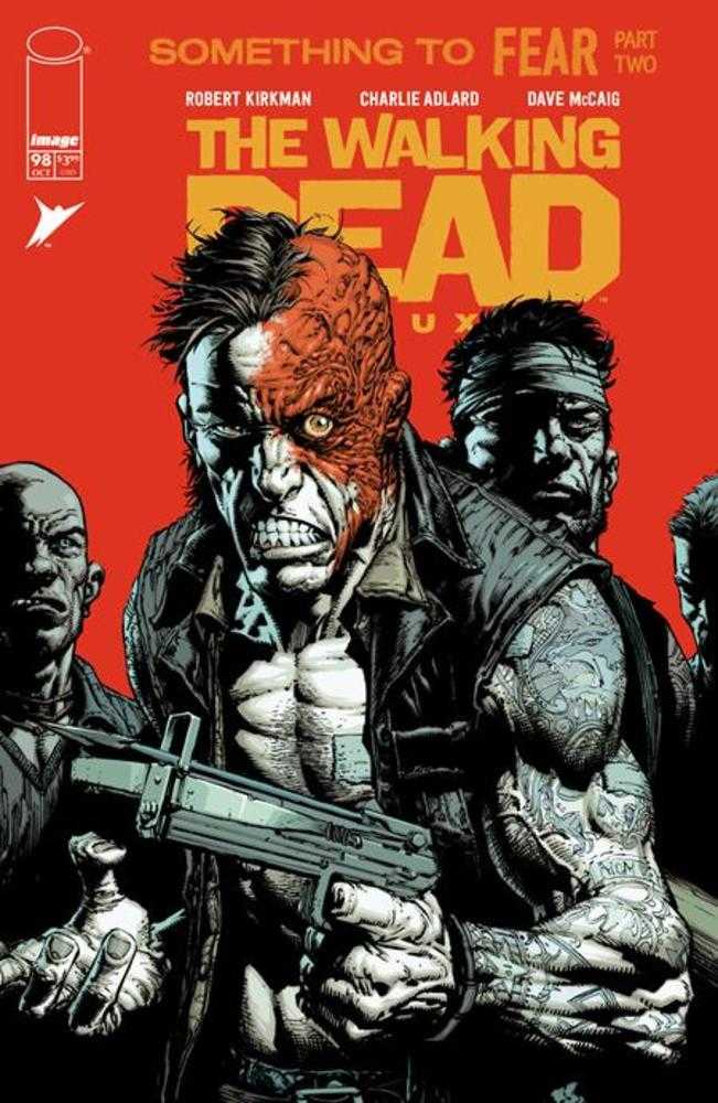 Comic book cover featuring a disfigured man holding a machine gun.